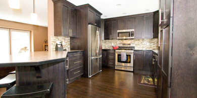 Maple shaker cabinets stained dark walnut